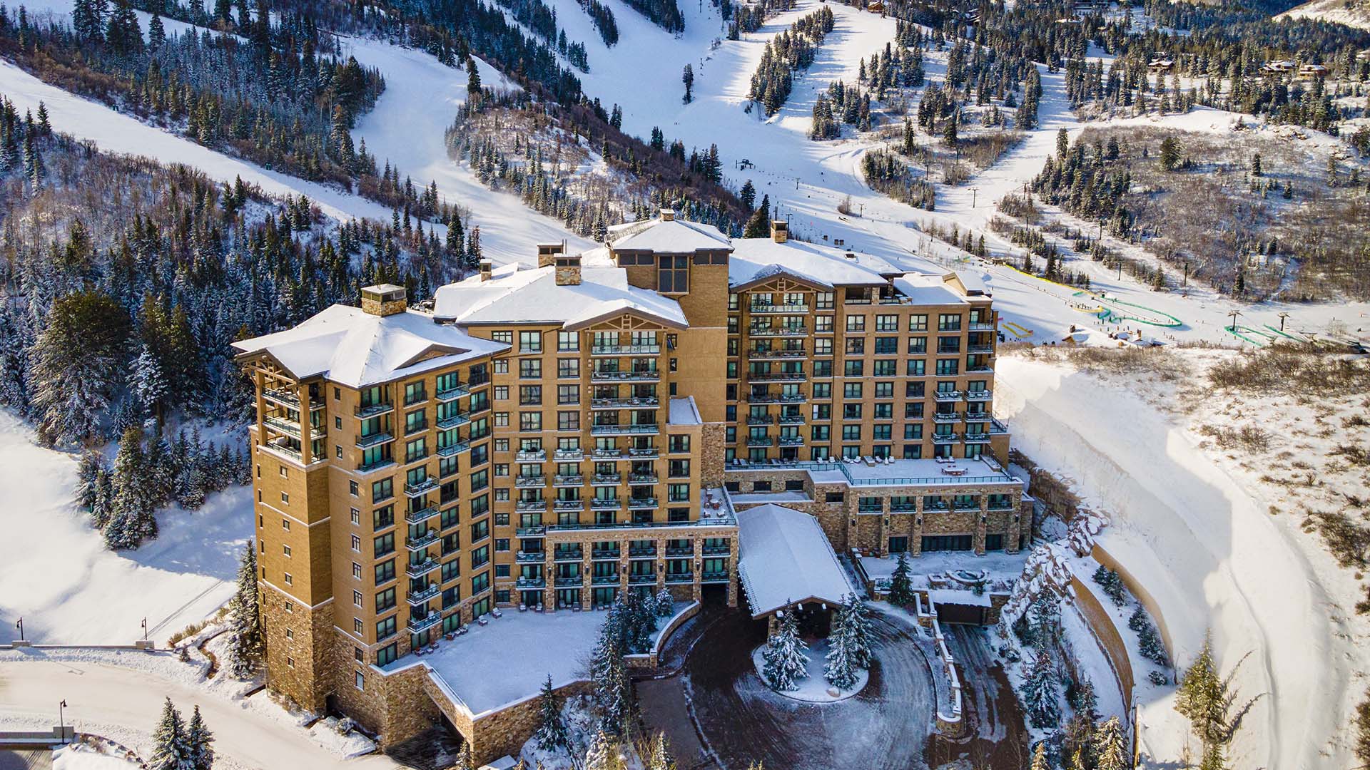aerial view of The St. Regis Deer Valley and the surrounding snowy, mountainous landscape
