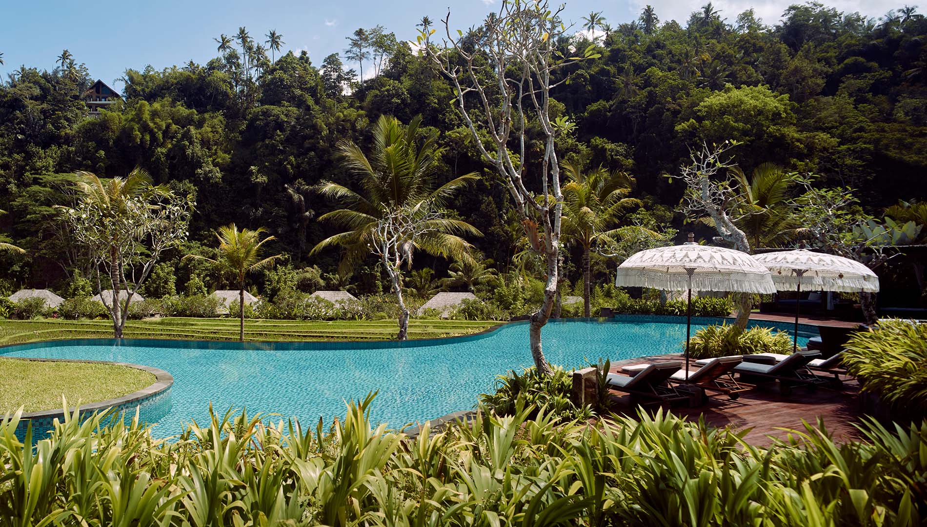 A serene swimming pool at Mandapa, a Ritz-Carlton Reserve