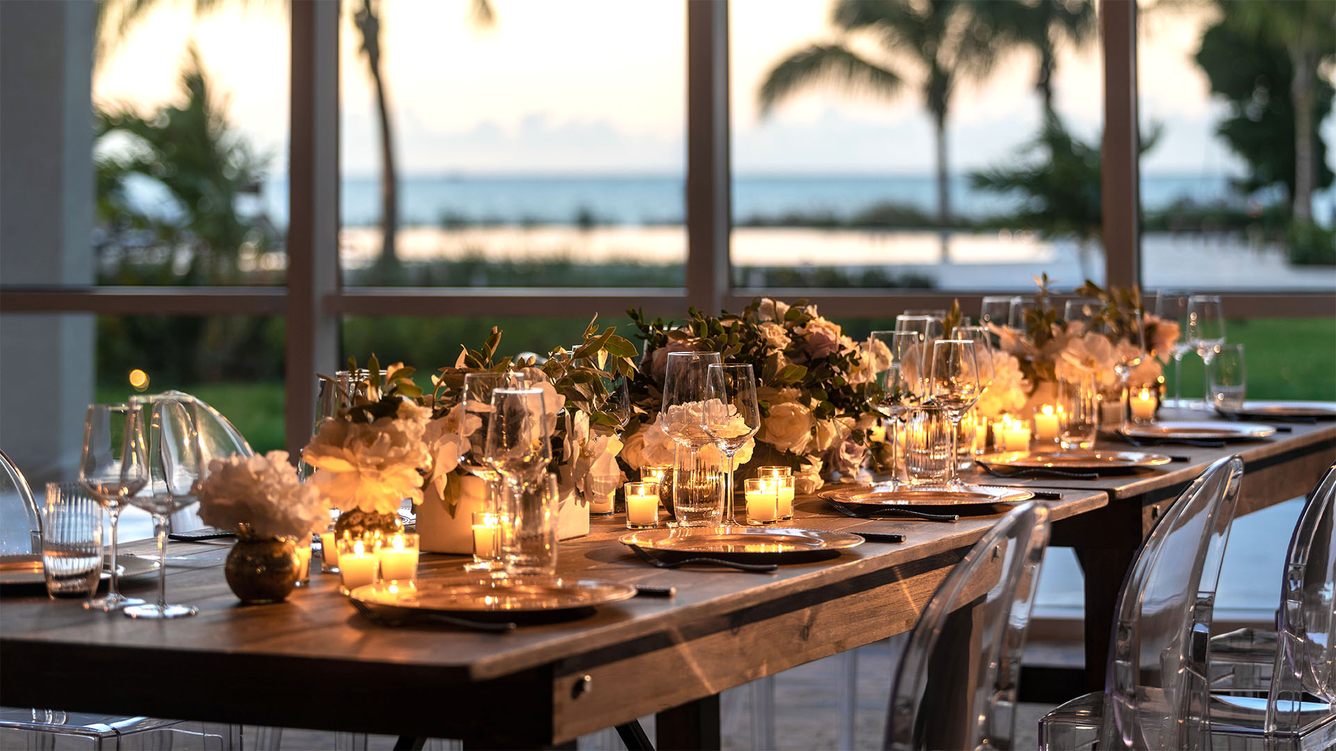 Dining table with a beautiful, candlelit table setting at The Ritz-Carlton, Turks & Caicos