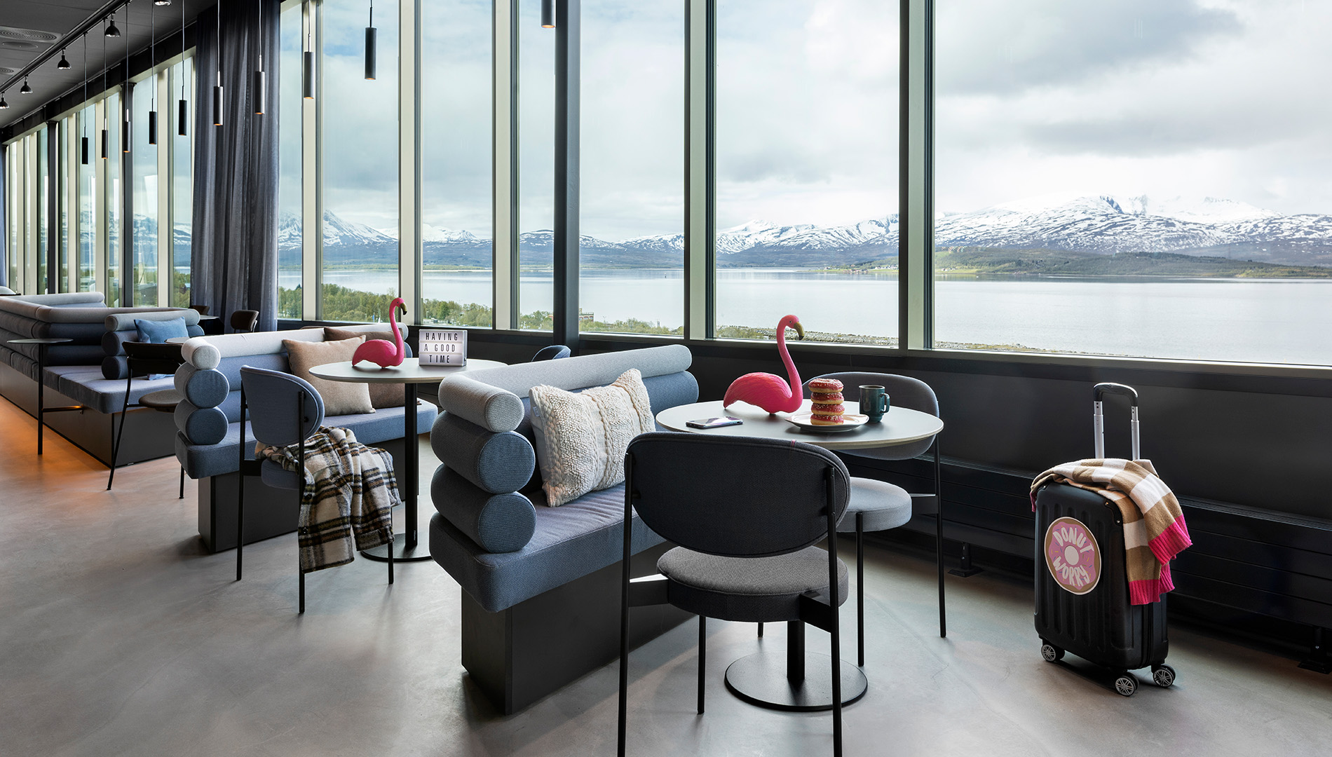 A seating area in the Lounge Lobby of Moxy Tromsø