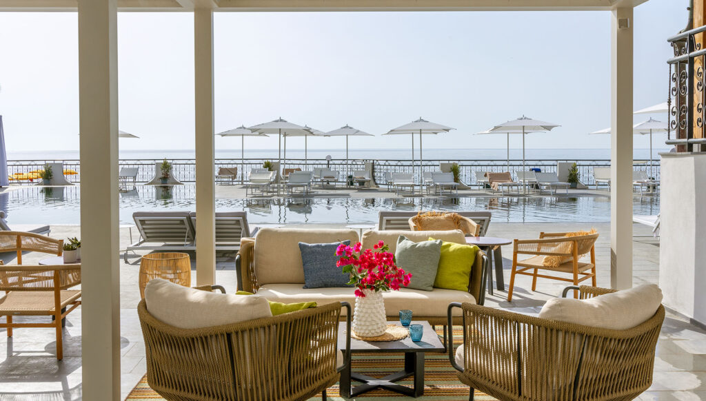 The pool terrace at Delta Hotels by Marriott Giardini Naxos in Sicily