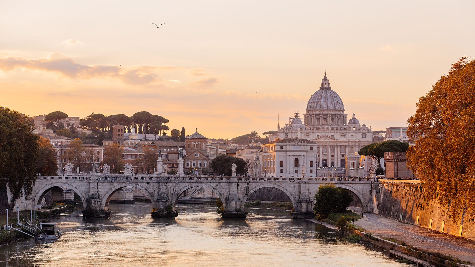 rome skyline with tiber river during autumn