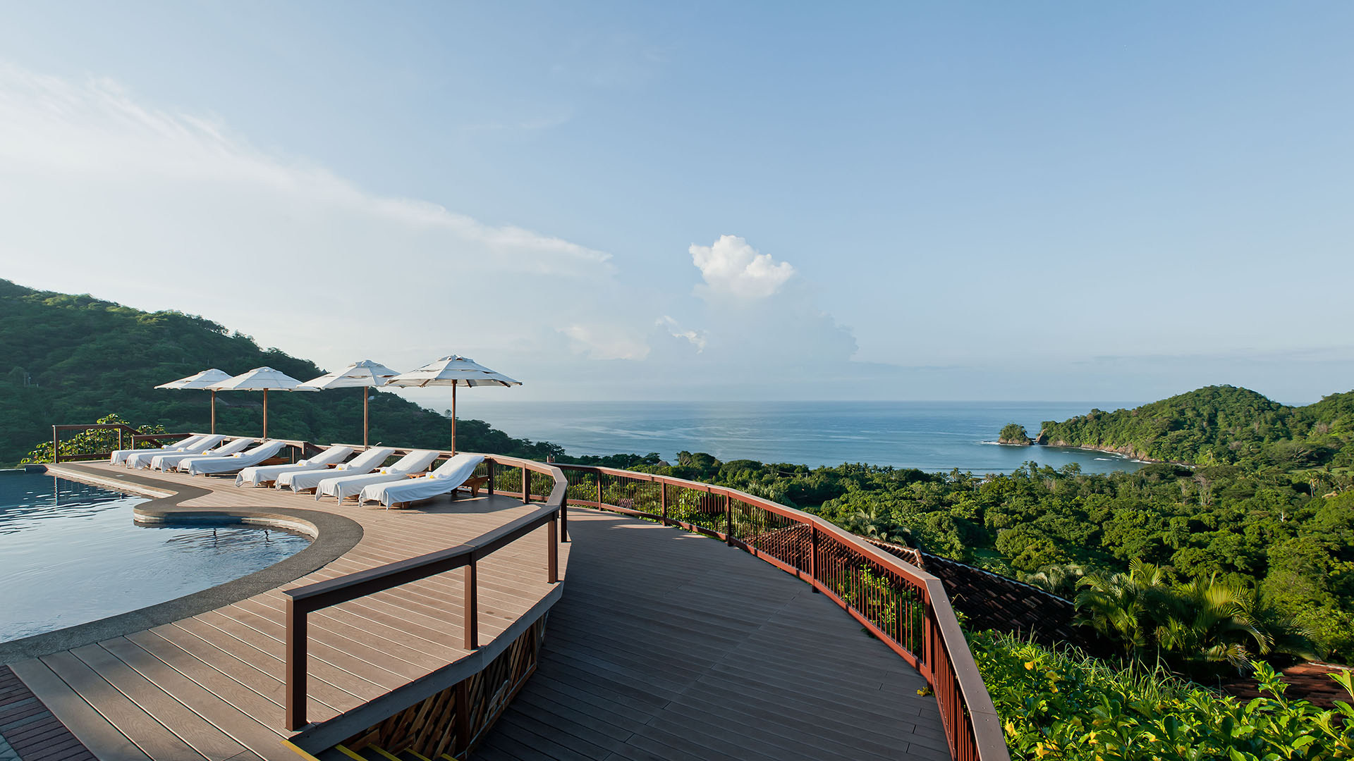view of the ocean from the pool at punta islita, autograph collection