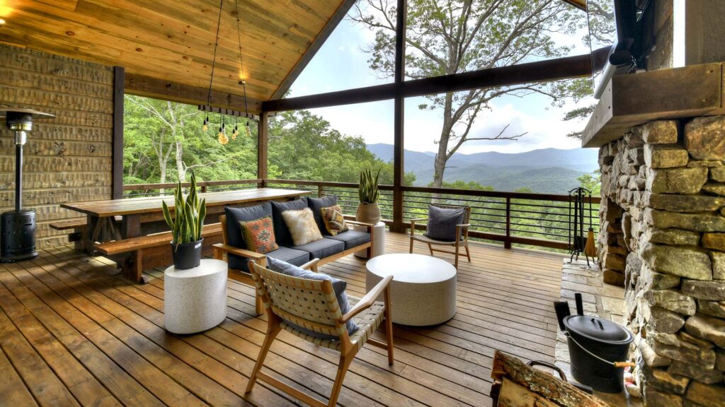 A porch at a Homes & Villas by Marriott Bonvoy family vacation rental with a view of the mountains