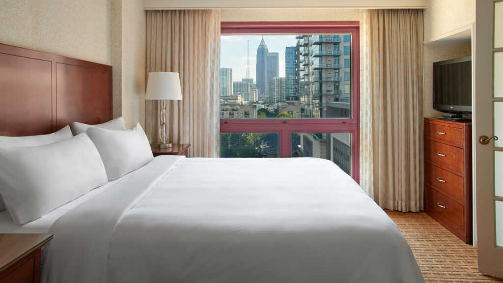a guest room with a great view at Atlanta Marriott Suites Midtown
