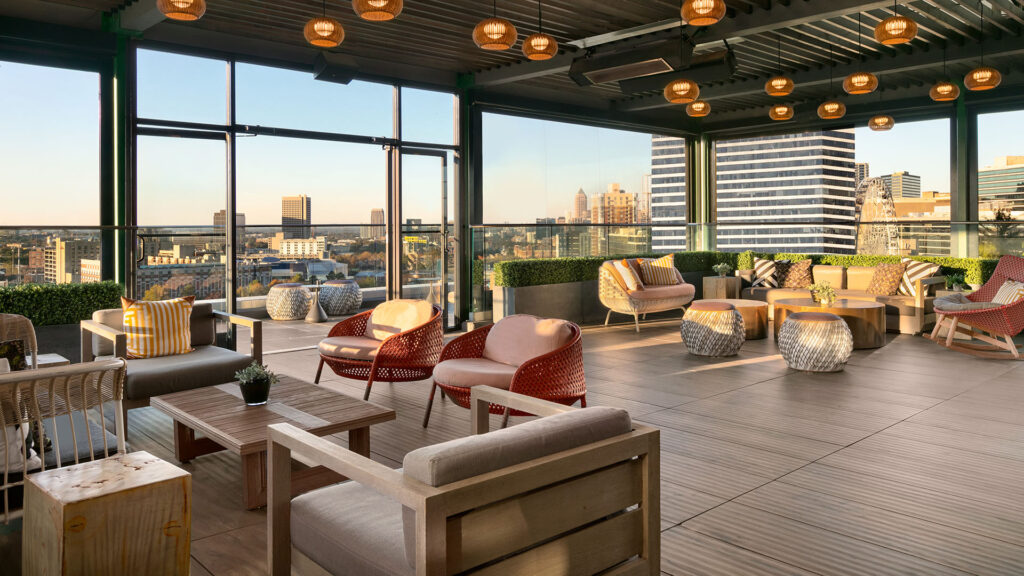 seating areas at SkyLounge Rooftop at Glenn Hotel, Autograph Collection 